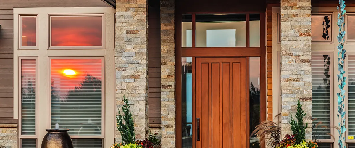 brown wooden front door with windows