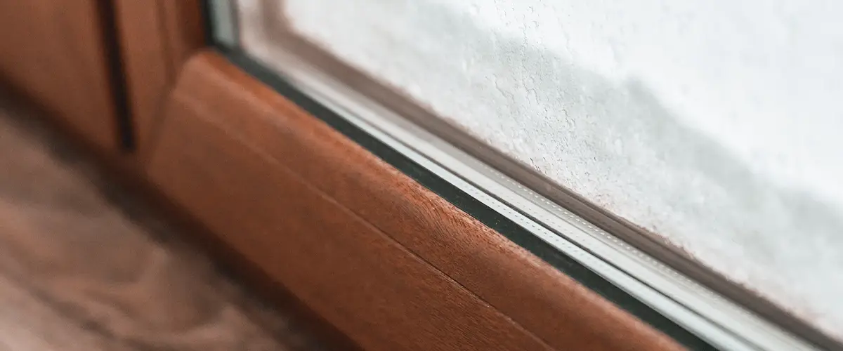 Brown Pvc Window Close Up During Snowy Weather